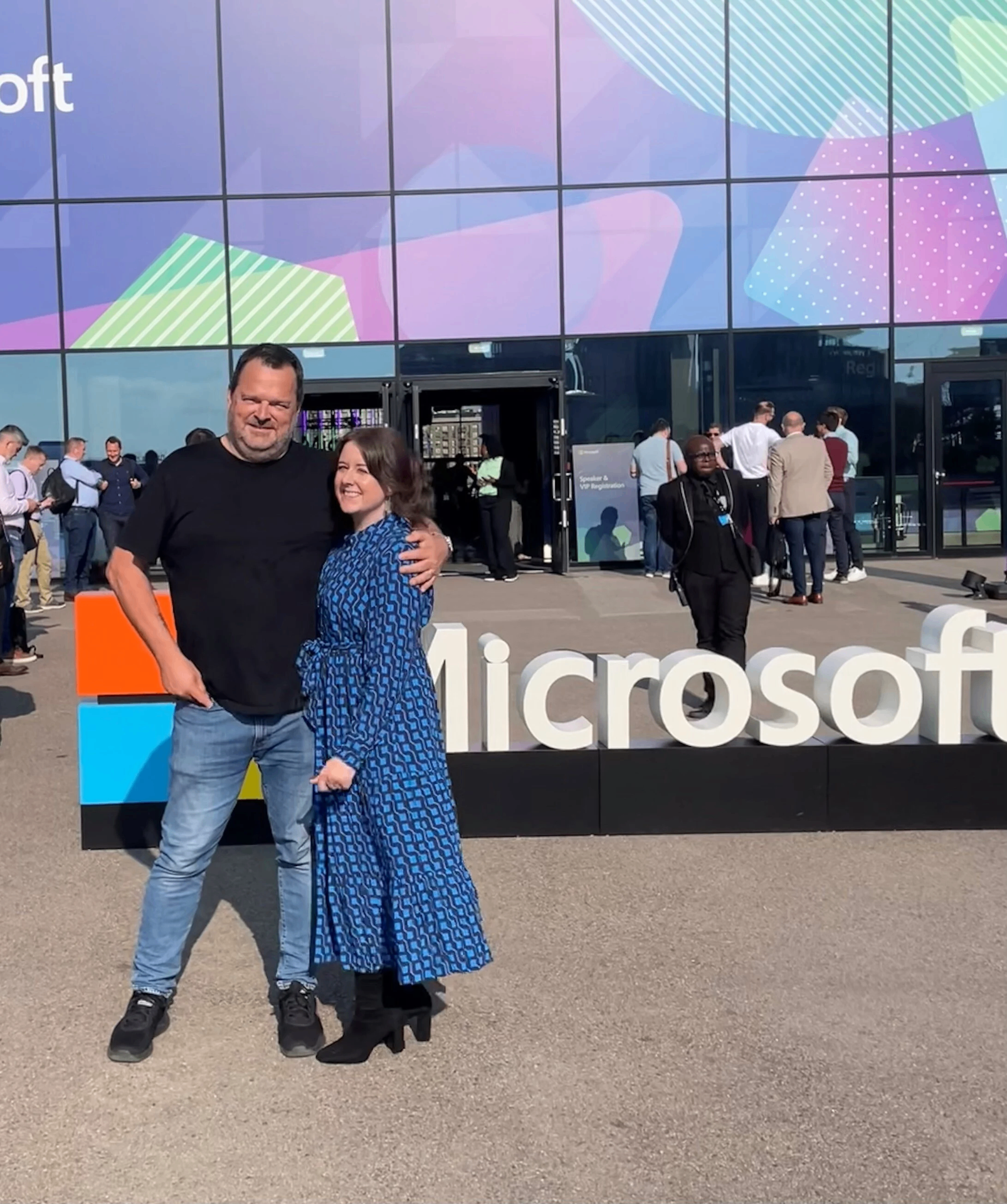 Rich Shipton with a colleague in front of the Microsoft sign